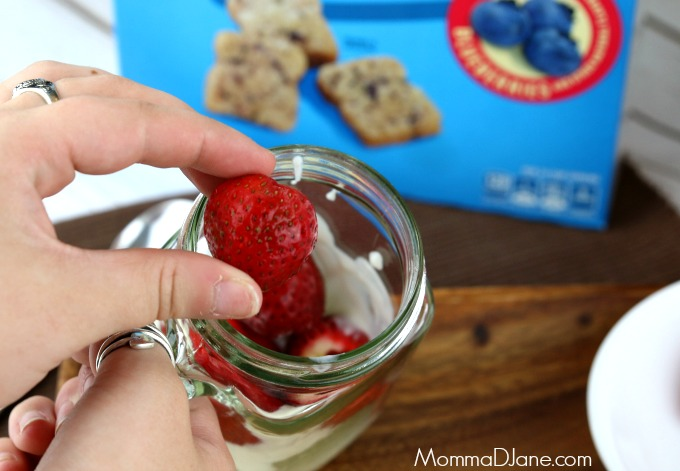 add strawberries to parfait