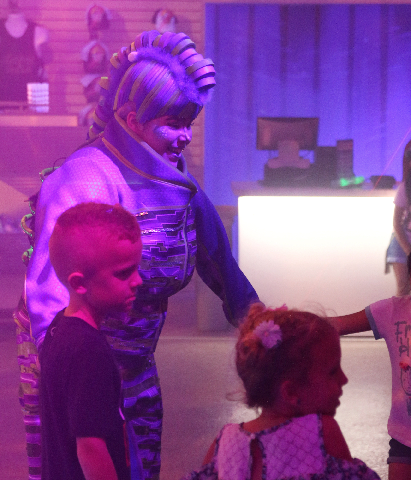 SeaWorld staff dancing with kids