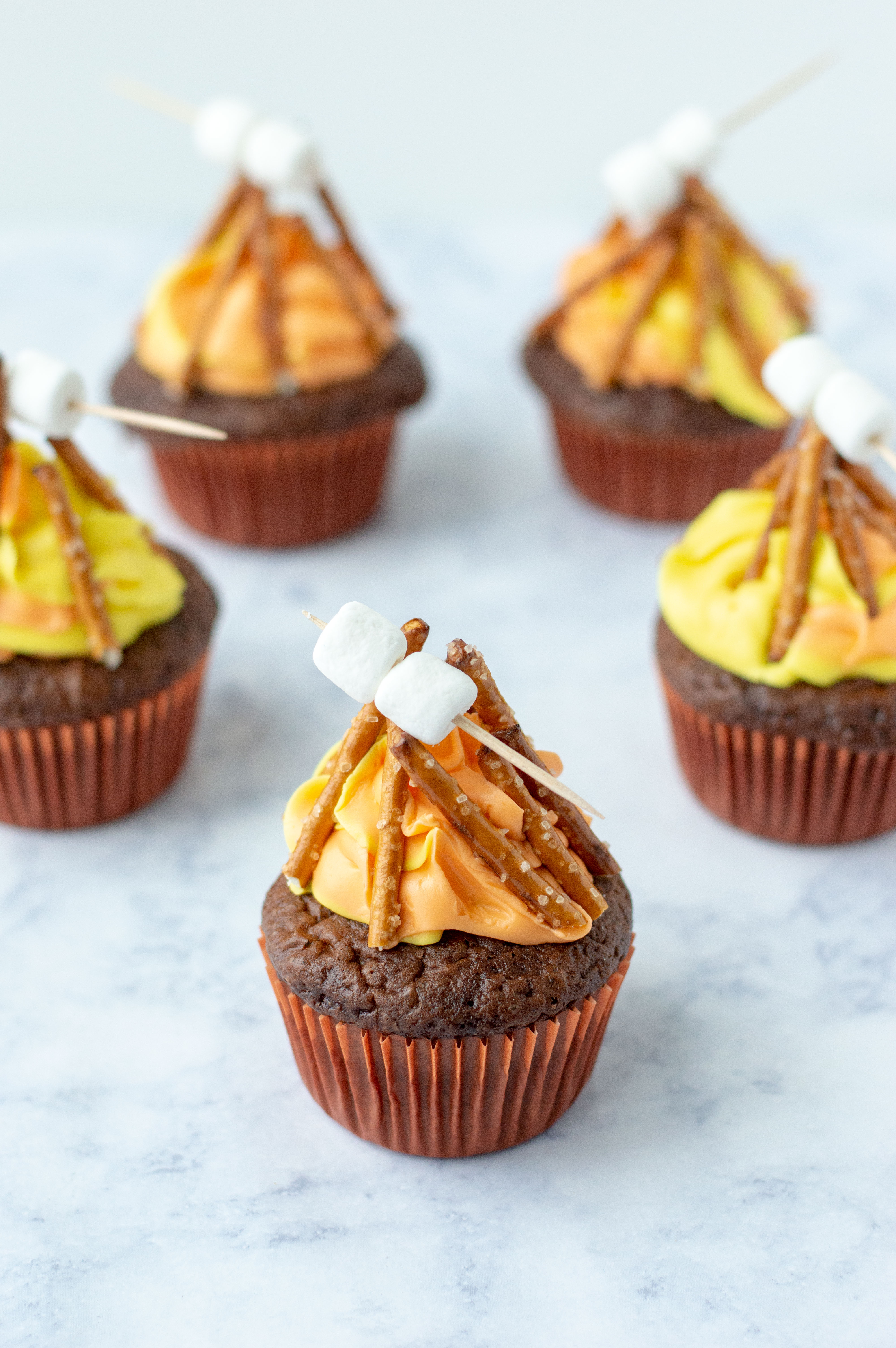 put marshmallows on campfire cupcakes
