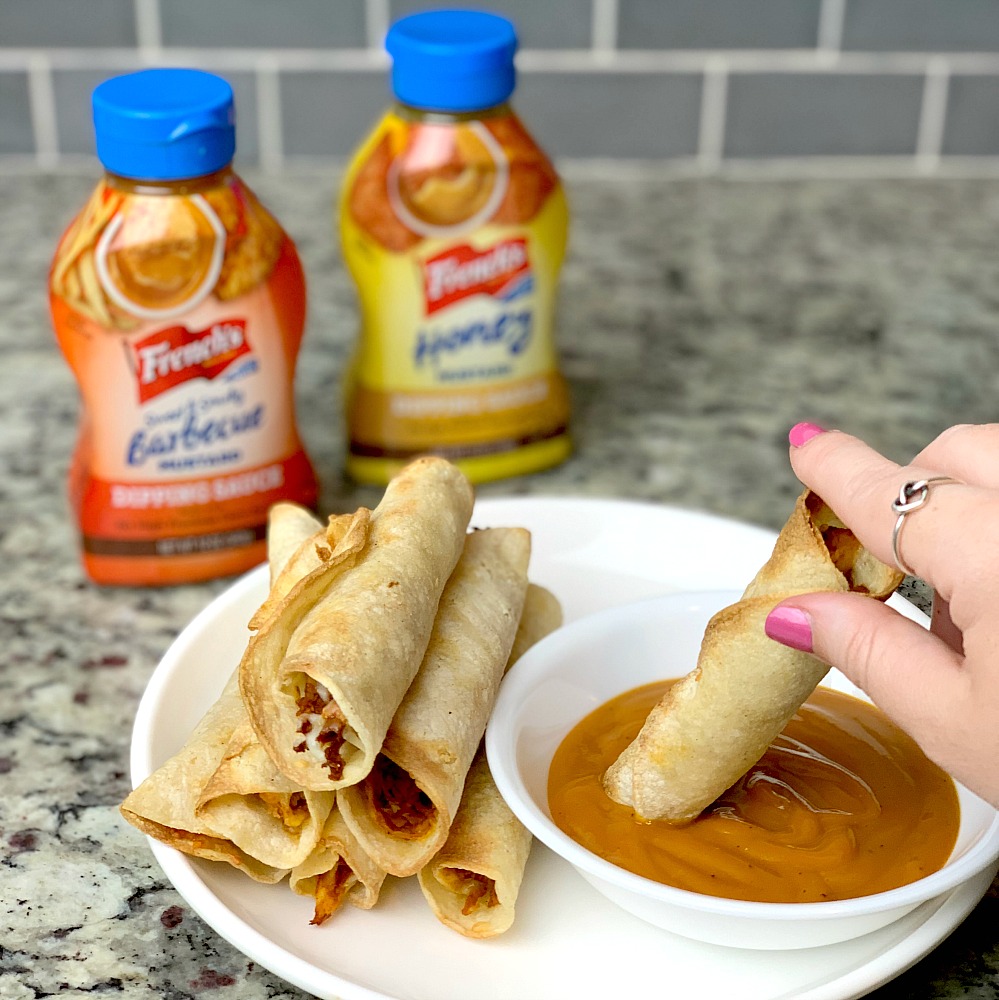dip homemade taquito in French's Sweet & Smoky Barbecue Mustard